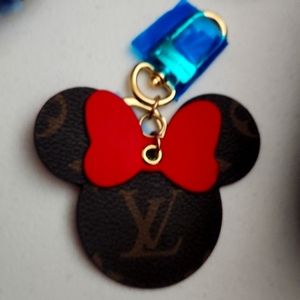 Mickey mouse keychains. Real leather. 15 bucks, each without box and dust co…